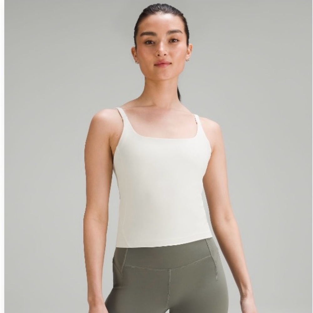 Slightly cropped sports top.